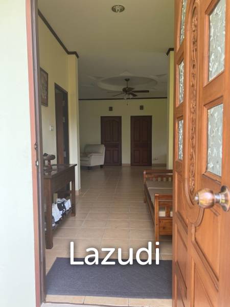 Beautiful 2-bedroom house with large land plot and garden