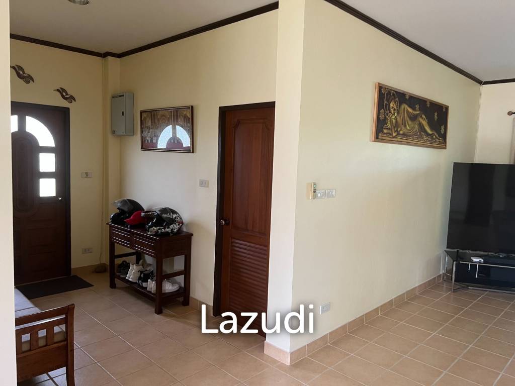Beautiful 2-bedroom house with large land plot and garden