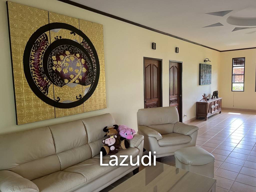 Beautiful 2-bedroom house with large land plot and garden