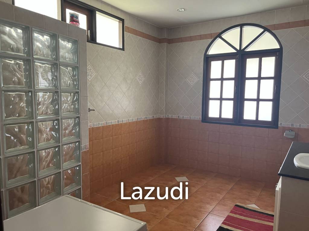 Beautiful 2-bedroom house with large land plot and garden