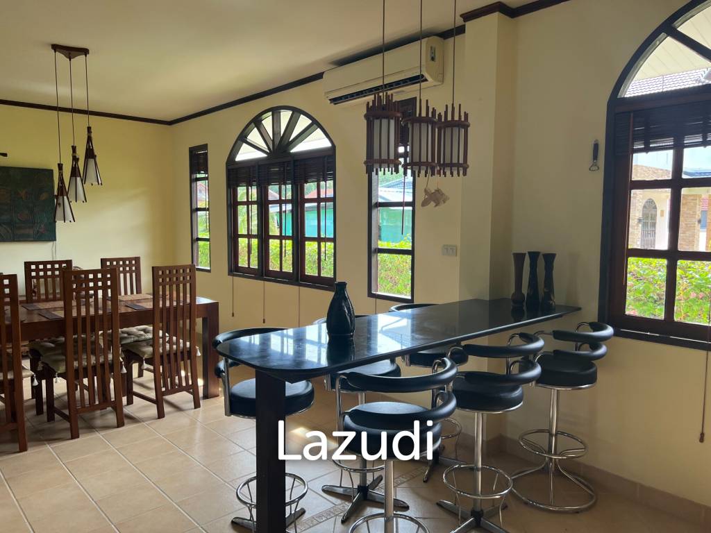 Beautiful 2-bedroom house with large land plot and garden