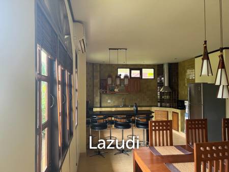 Beautiful 2-bedroom house with large land plot and garden