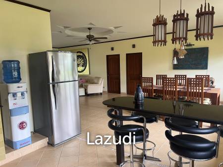 Beautiful 2-bedroom house with large land plot and garden