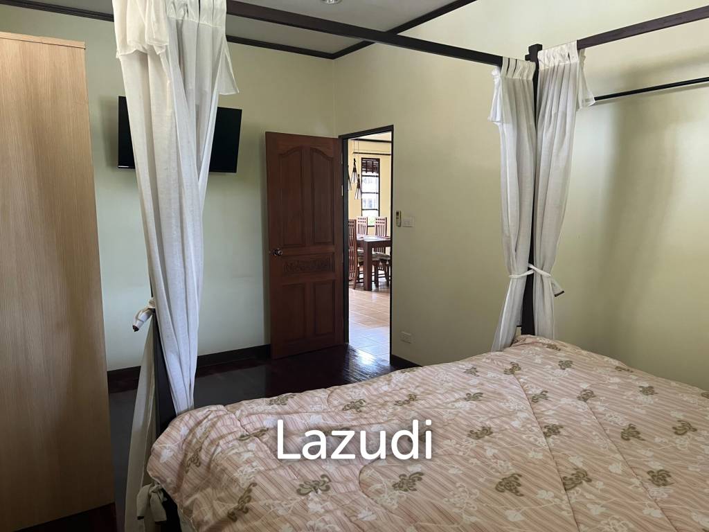 Beautiful 2-bedroom house with large land plot and garden