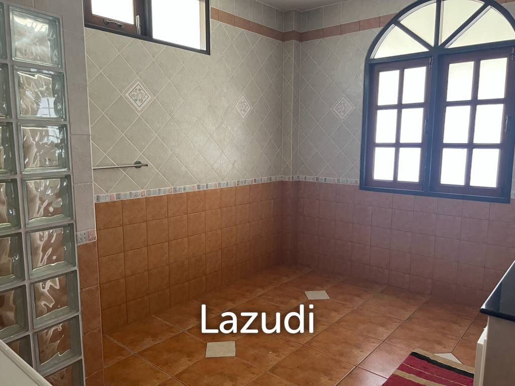 Beautiful 2-bedroom house with large land plot and garden