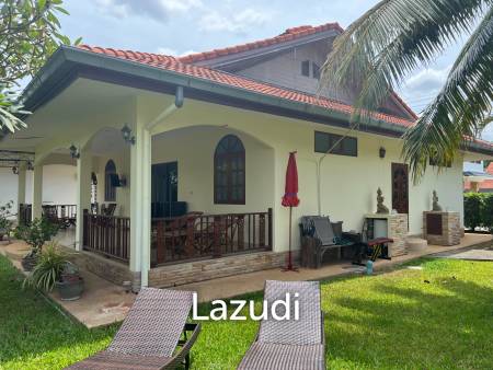 Beautiful 2-bedroom house with large land plot and garden