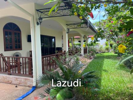 Beautiful 2-bedroom house with large land plot and garden
