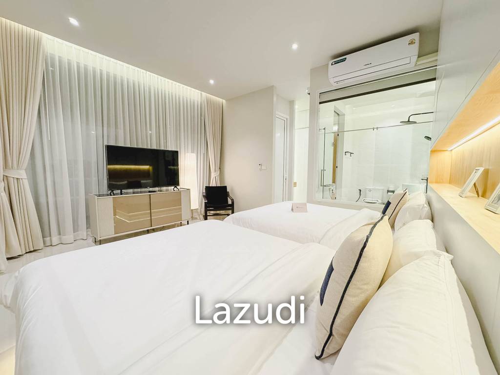 Modern pool villa with slide in Pak Nam Pran