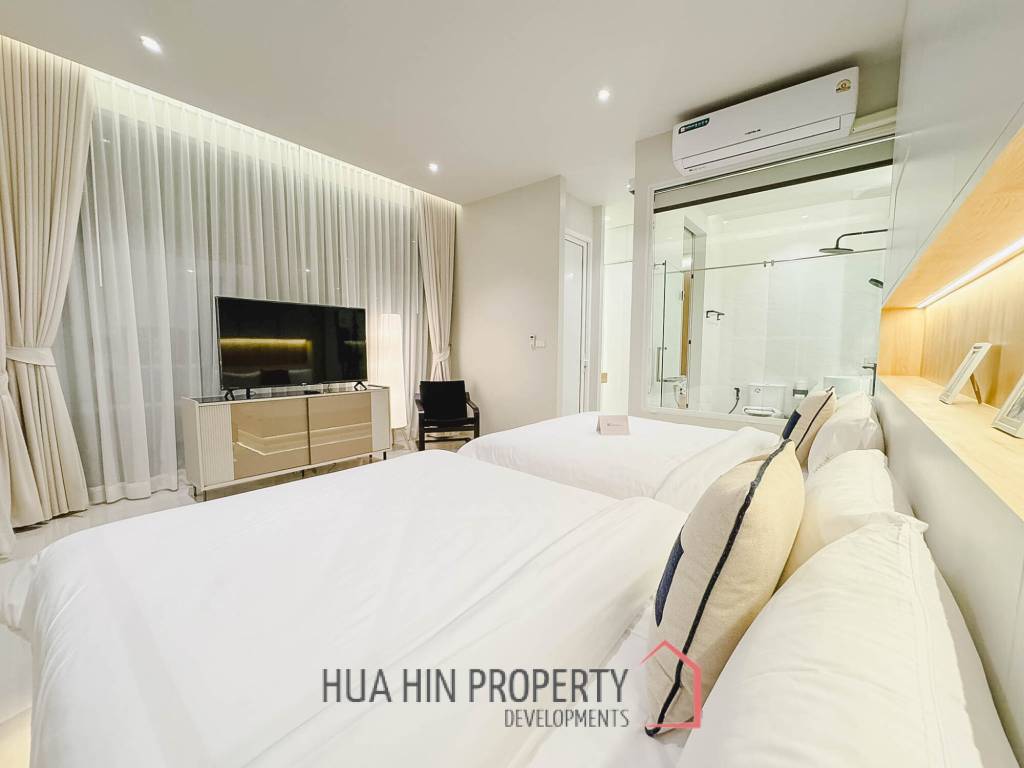 Modern pool villa with slide in Pak Nam Pran