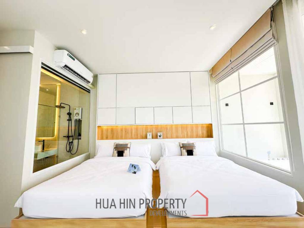 Modern pool villa with slide in Pak Nam Pran