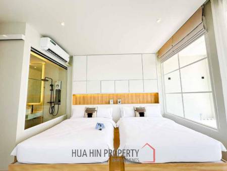 Modern pool villa with slide in Pak Nam Pran