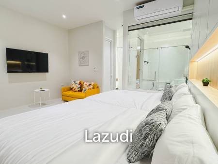 Modern pool villa with slide in Pak Nam Pran