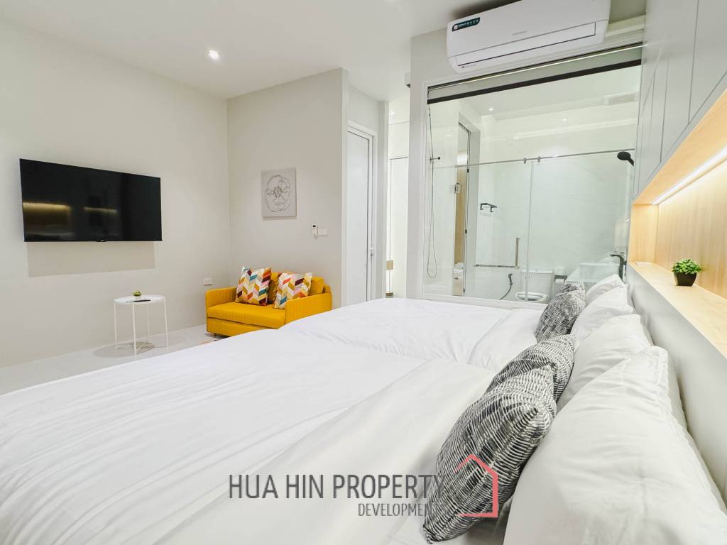 Modern pool villa with slide in Pak Nam Pran