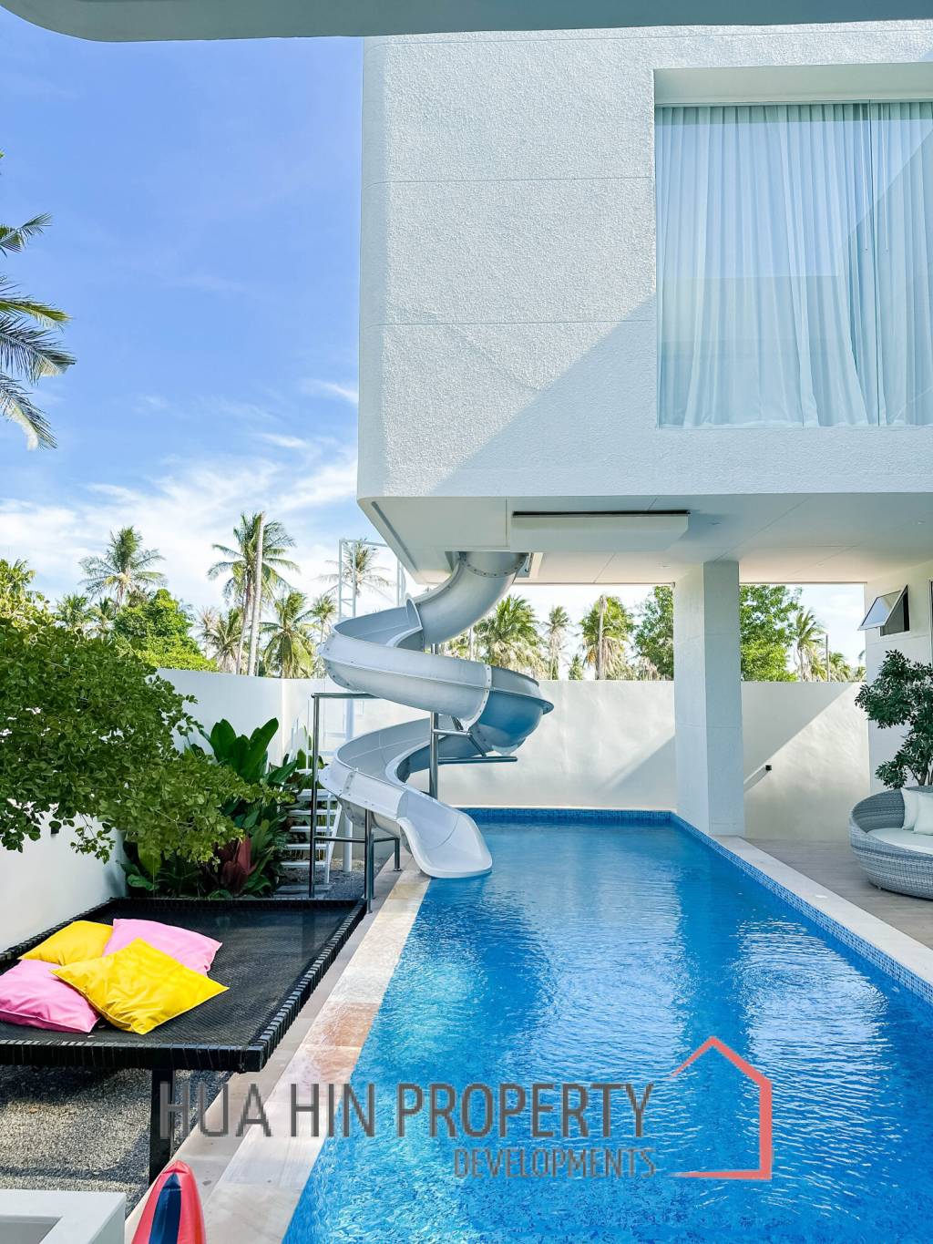 Modern pool villa with slide in Pak Nam Pran