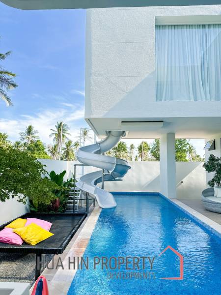 Modern pool villa with slide in Pak Nam Pran