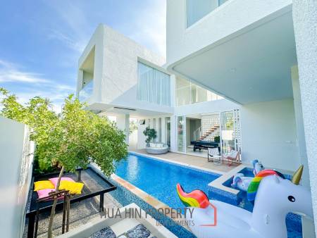 Modern pool villa with slide in Pak Nam Pran