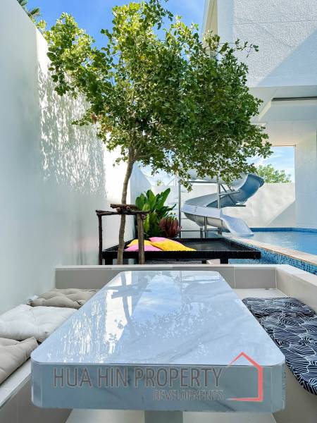 Modern pool villa with slide in Pak Nam Pran