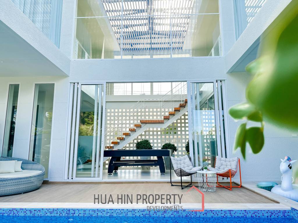 Modern pool villa with slide in Pak Nam Pran