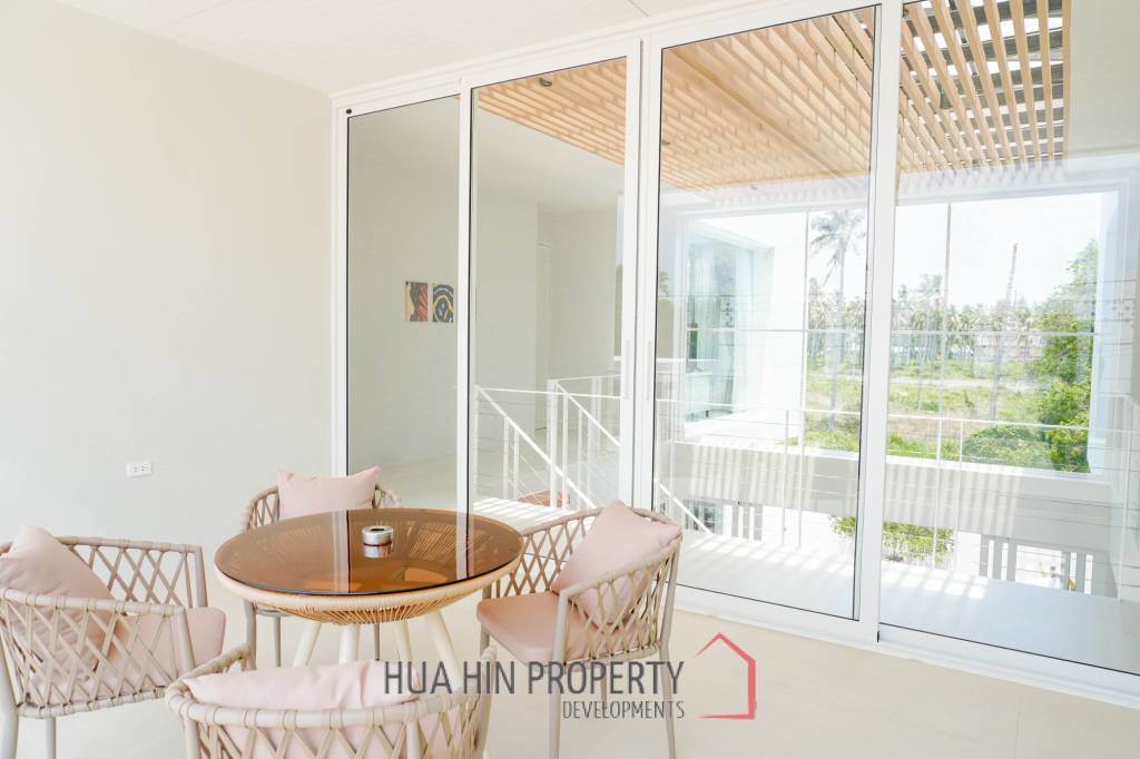 Modern pool villa with slide in Pak Nam Pran
