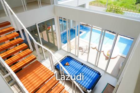 Modern pool villa with slide in Pak Nam Pran