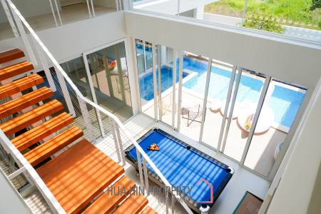 Modern pool villa with slide in Pak Nam Pran