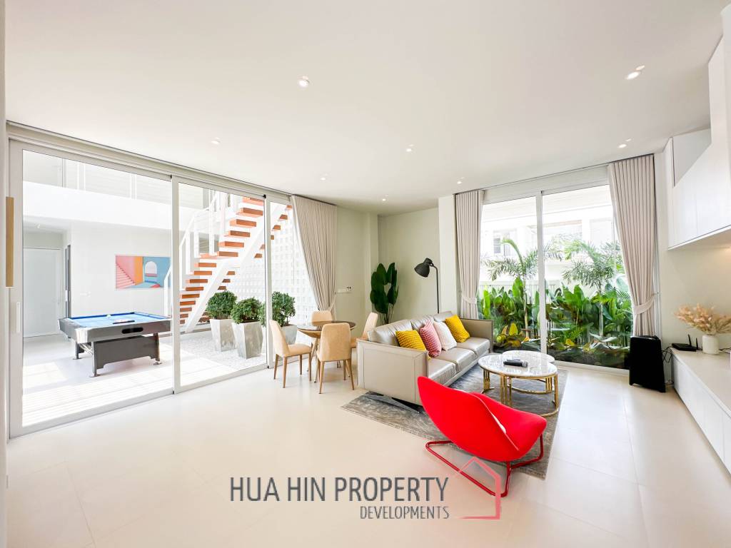 Modern pool villa with slide in Pak Nam Pran