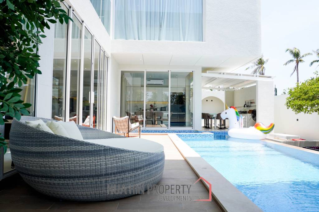 Modern pool villa with slide in Pak Nam Pran