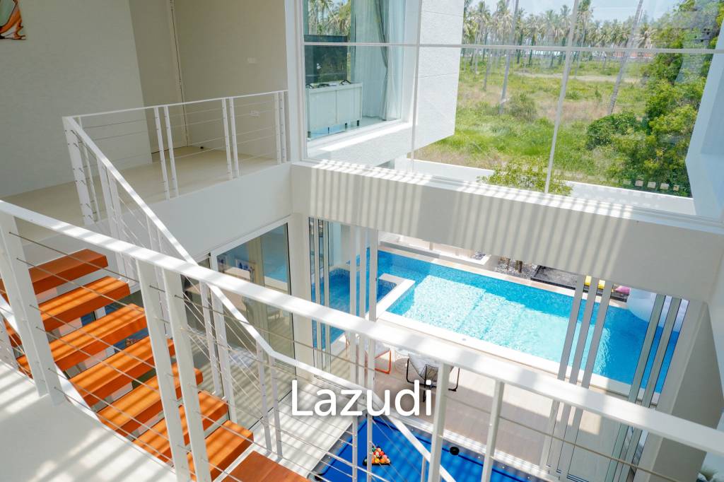Modern pool villa with slide in Pak Nam Pran