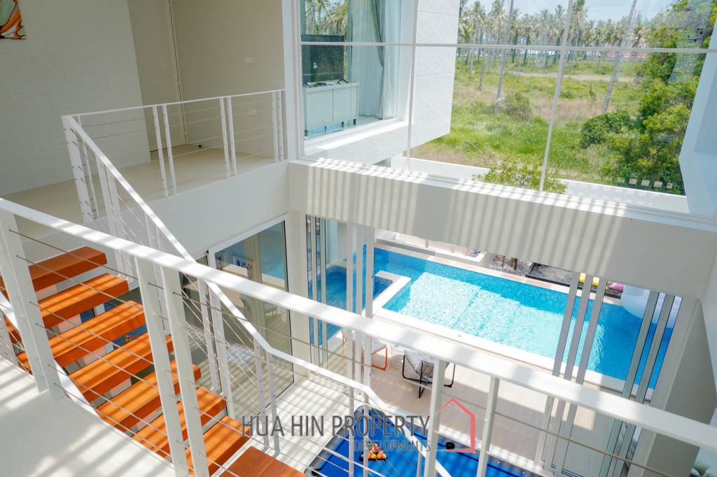 Modern pool villa with slide in Pak Nam Pran