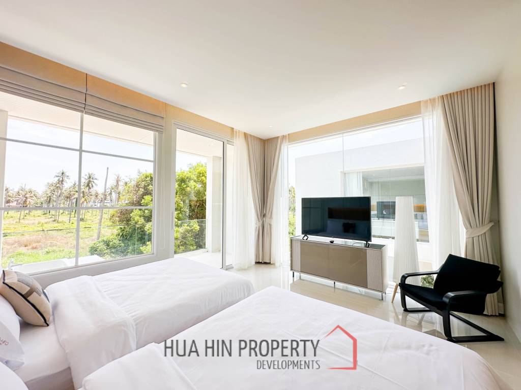 Modern pool villa with slide in Pak Nam Pran