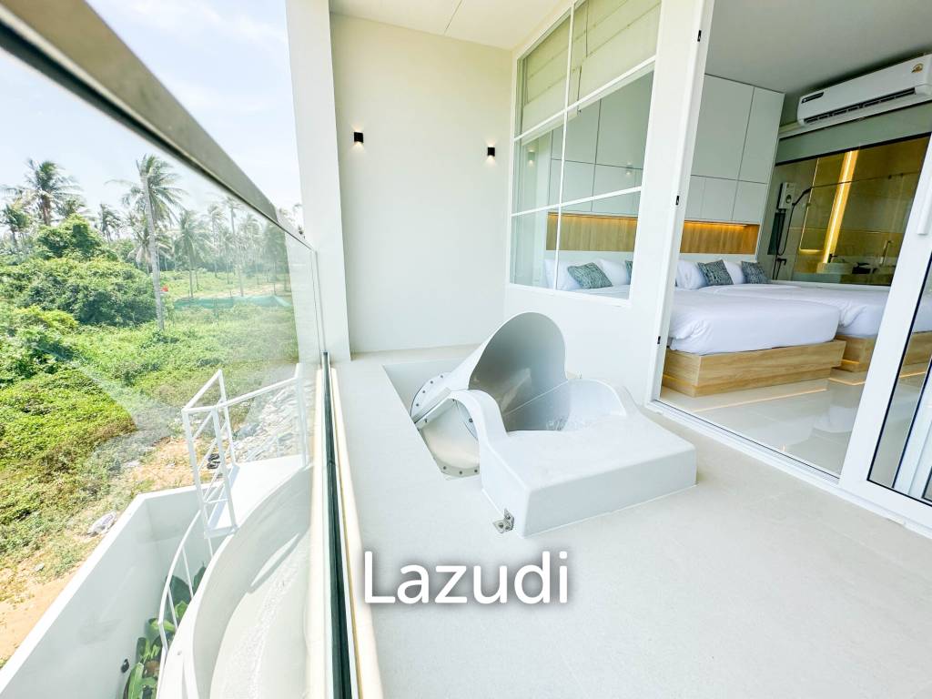 Modern pool villa with slide in Pak Nam Pran