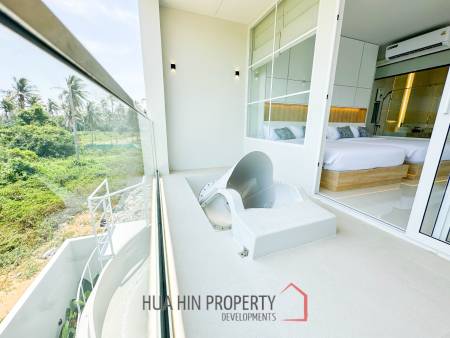Modern pool villa with slide in Pak Nam Pran