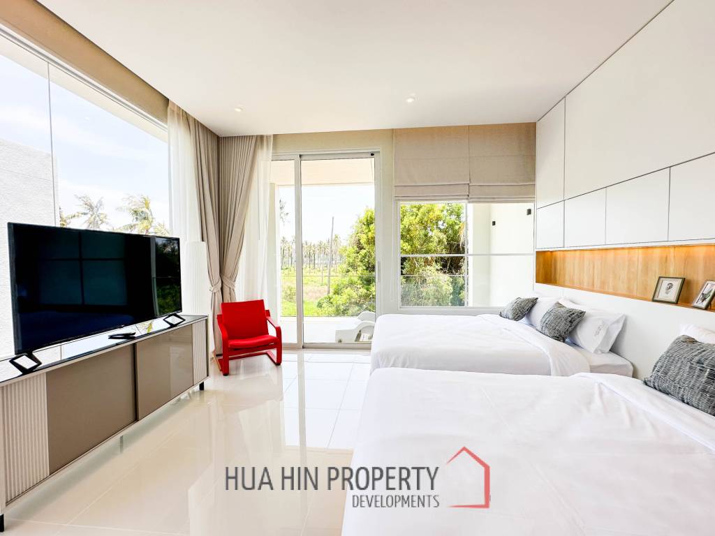 Modern pool villa with slide in Pak Nam Pran