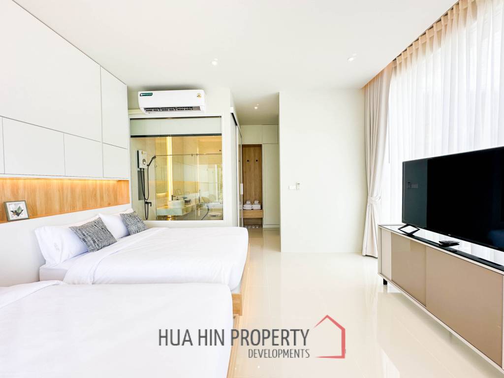 Modern pool villa with slide in Pak Nam Pran