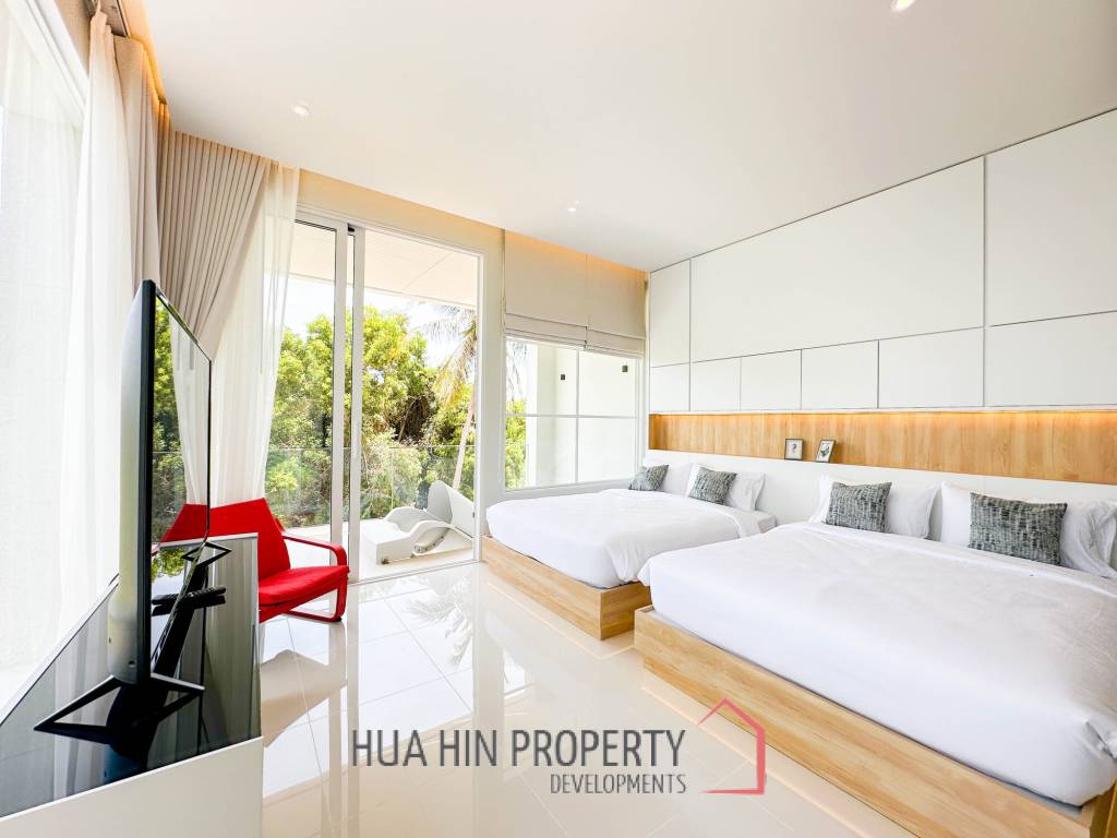 Modern pool villa with slide in Pak Nam Pran