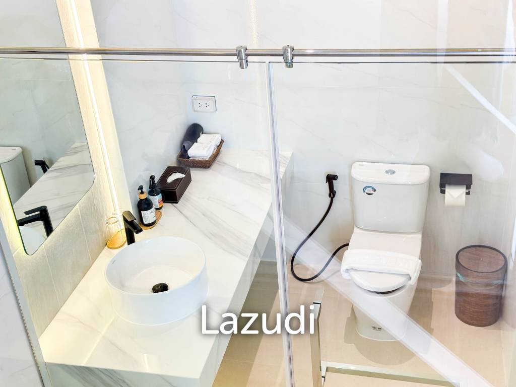 Modern pool villa with slide in Pak Nam Pran