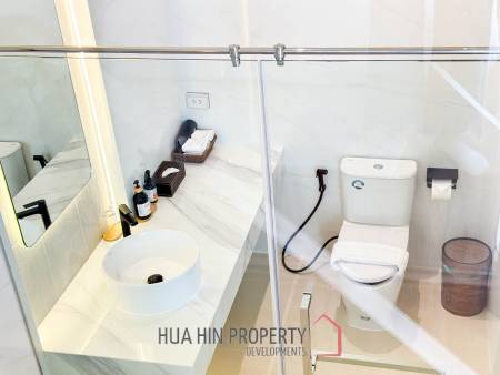 Modern pool villa with slide in Pak Nam Pran