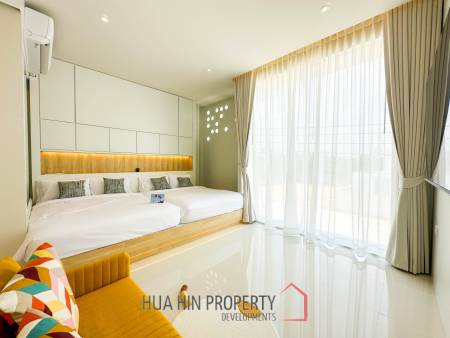 Modern pool villa with slide in Pak Nam Pran
