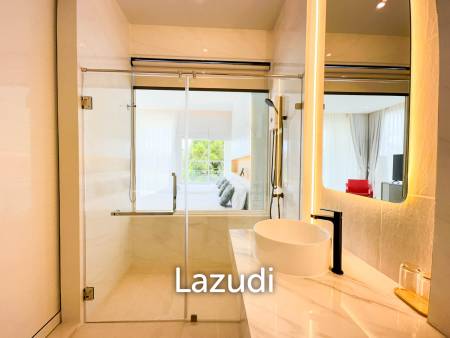 Modern pool villa with slide in Pak Nam Pran