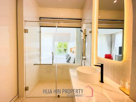 Modern pool villa with slide in Pak Nam Pran