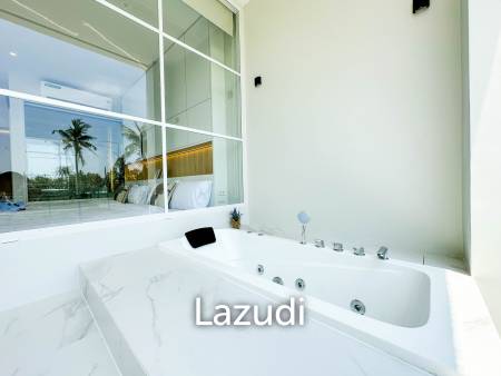 Modern pool villa with slide in Pak Nam Pran