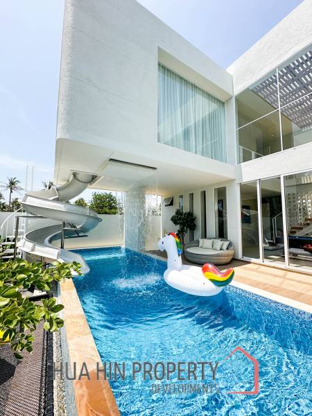 Modern pool villa with slide in Pak Nam Pran