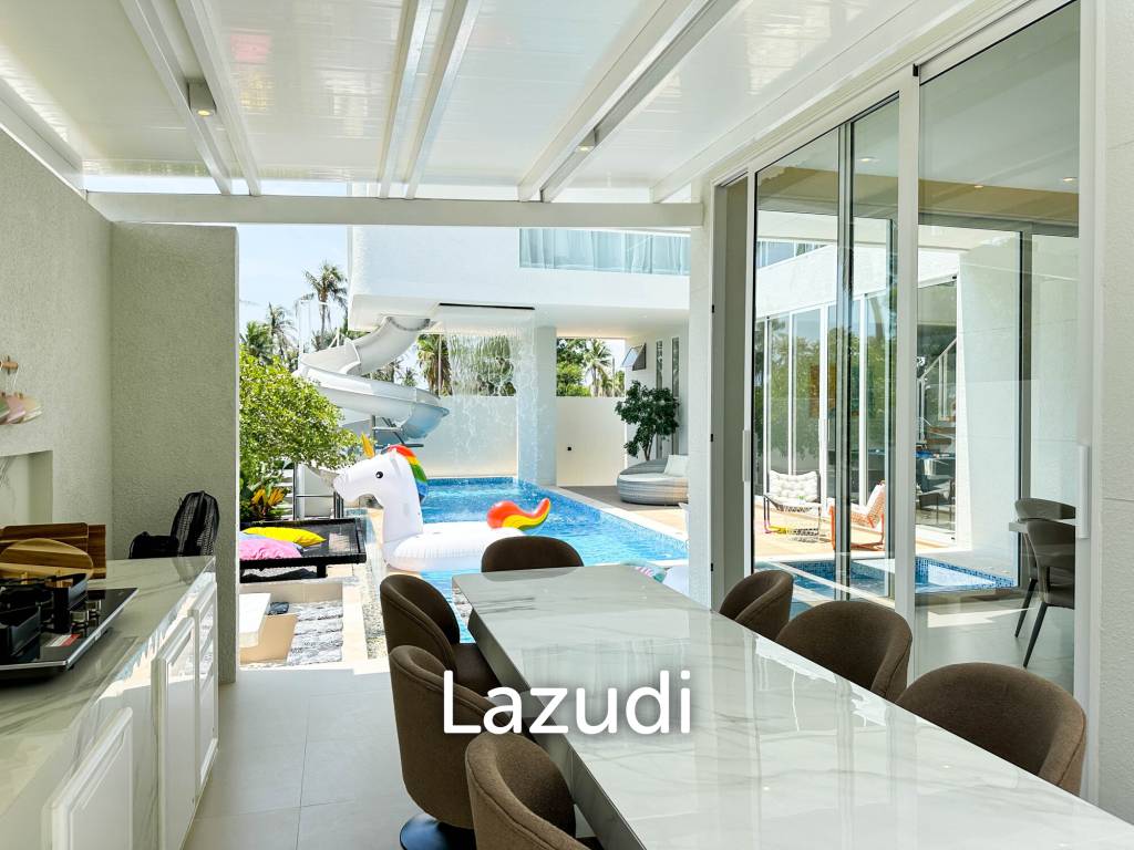 Modern pool villa with slide in Pak Nam Pran