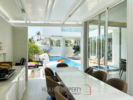 Modern pool villa with slide in Pak Nam Pran