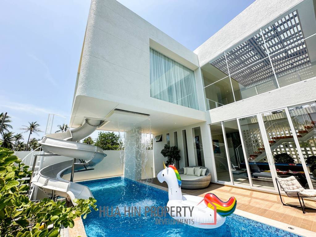 Modern pool villa with slide in Pak Nam Pran
