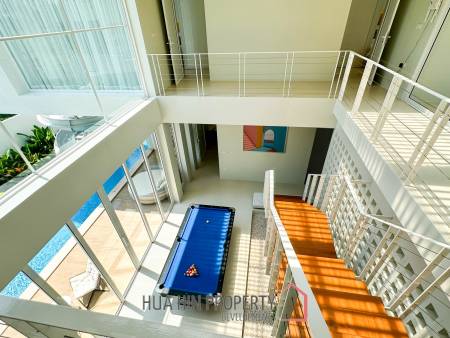 Modern pool villa with slide in Pak Nam Pran