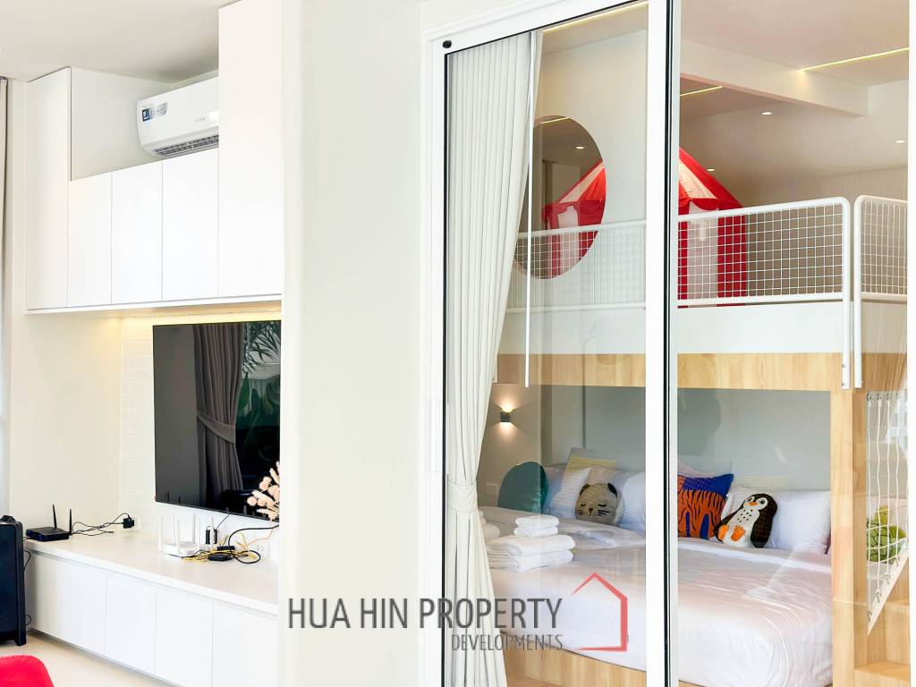 Modern pool villa with slide in Pak Nam Pran