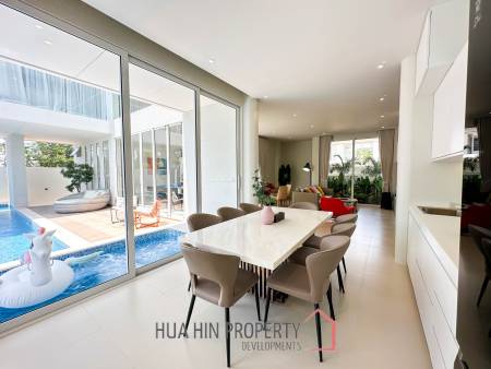 Modern pool villa with slide in Pak Nam Pran