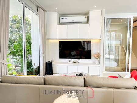 Modern pool villa with slide in Pak Nam Pran