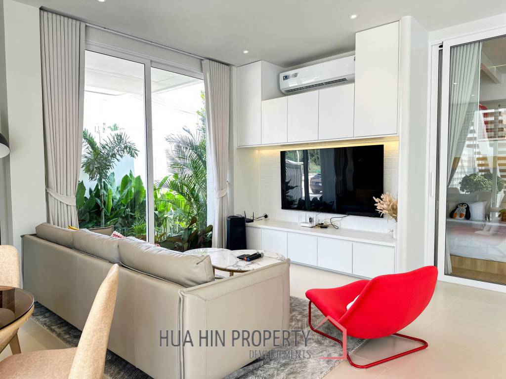 Modern pool villa with slide in Pak Nam Pran